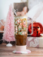 Pink Nutcracker 40oz glass tumbler with pink boot, peppermint mug rug and tree straw topper