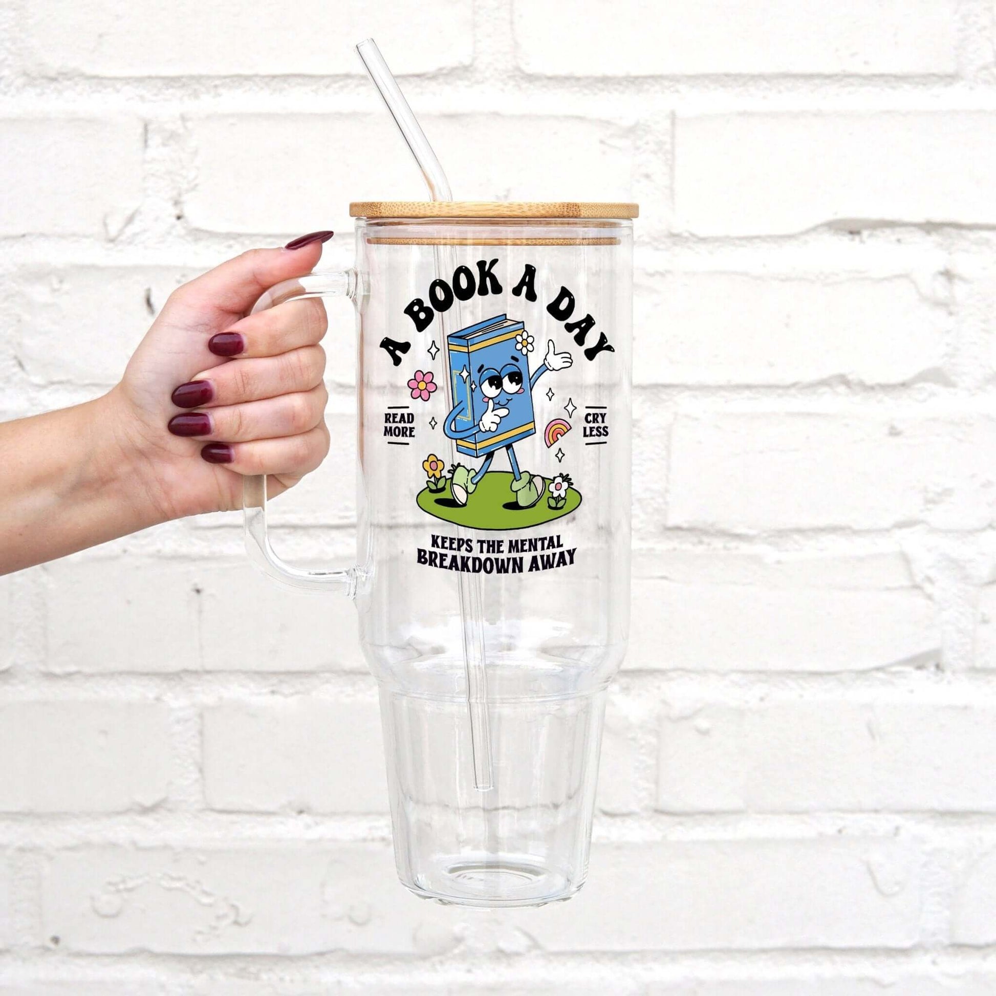 A Book A Day Mental Health 40oz Glass or Plastic Tumbler With Lid and Straw from Sip Sip Hooray – Drinkware