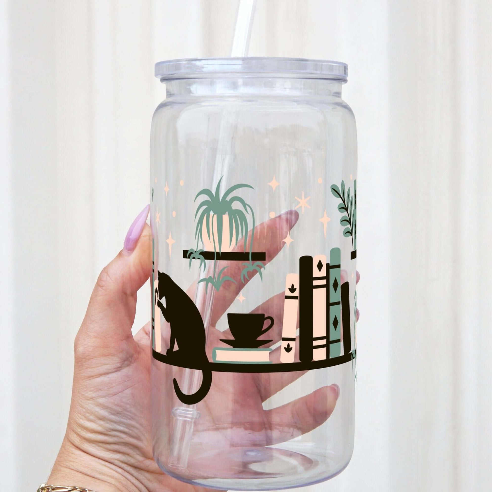 Book Shelves With Kitty and Plants Cup With Lid and Straw from Sip Sip Hooray – Drinkware