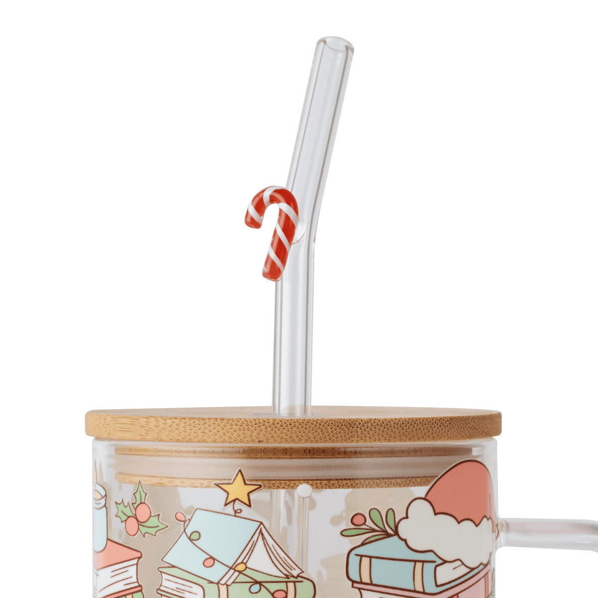 Candy cane glass straw in a Christmas glass cup with bamboo lid