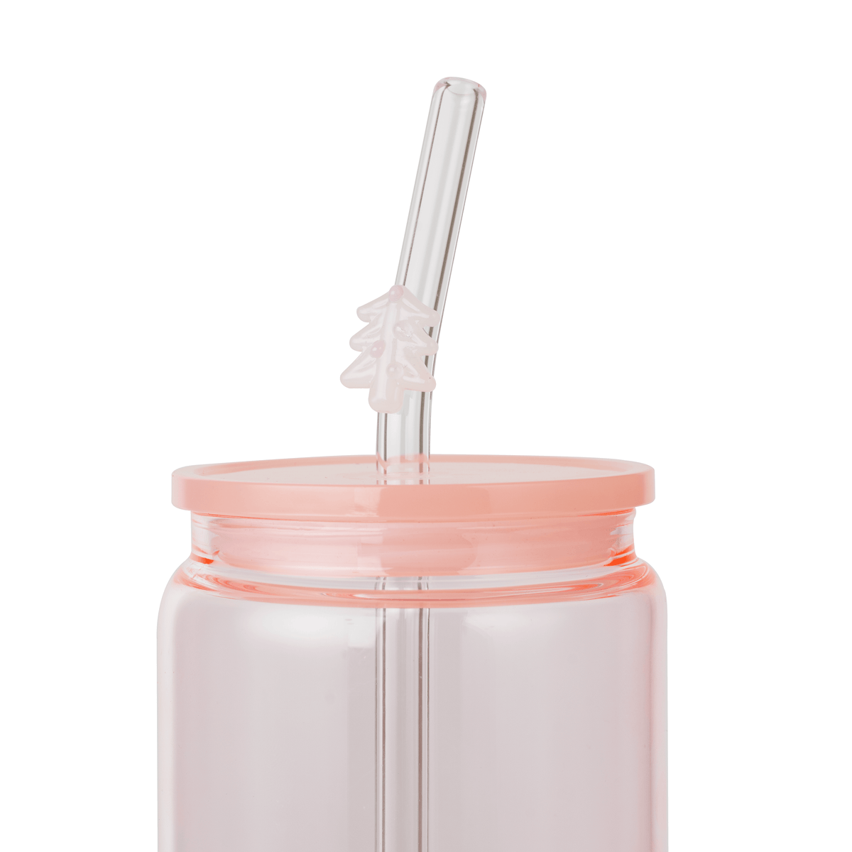 White tree glass straw in a pink glass cup