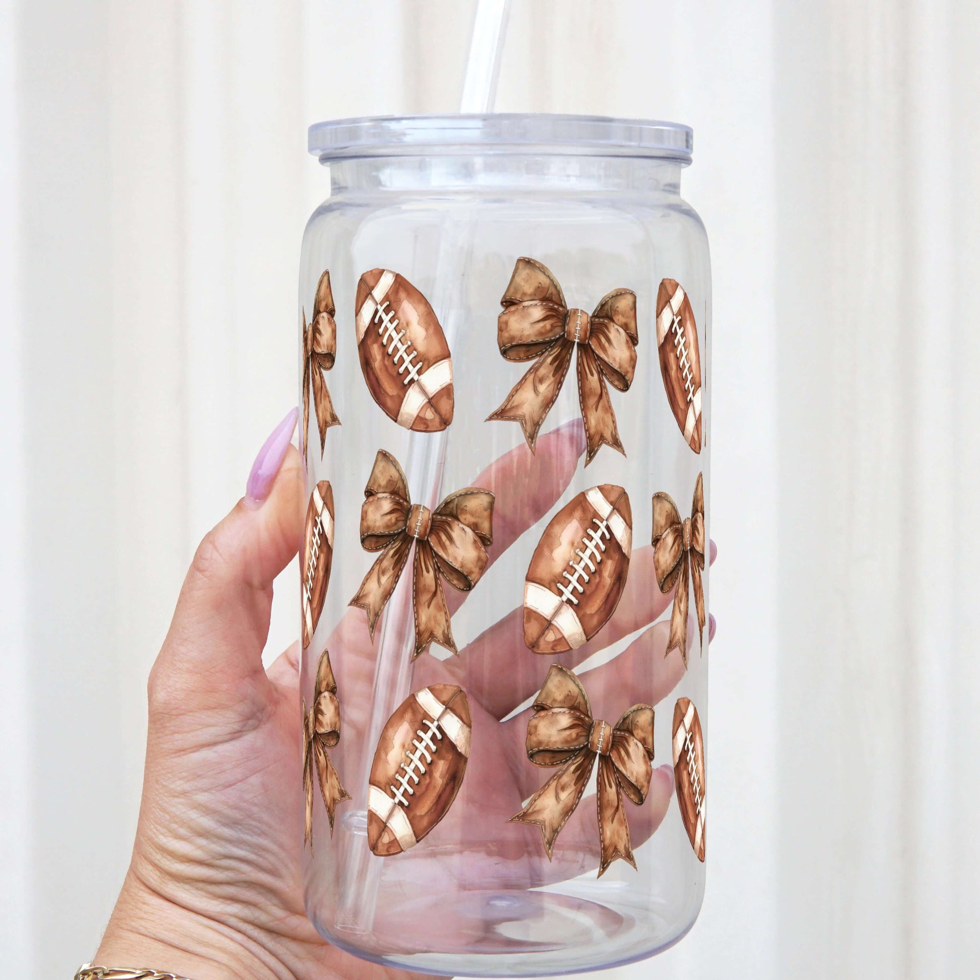 Football + Bows Cup With Lid and Straw from Sip Sip Hooray – Tumblers