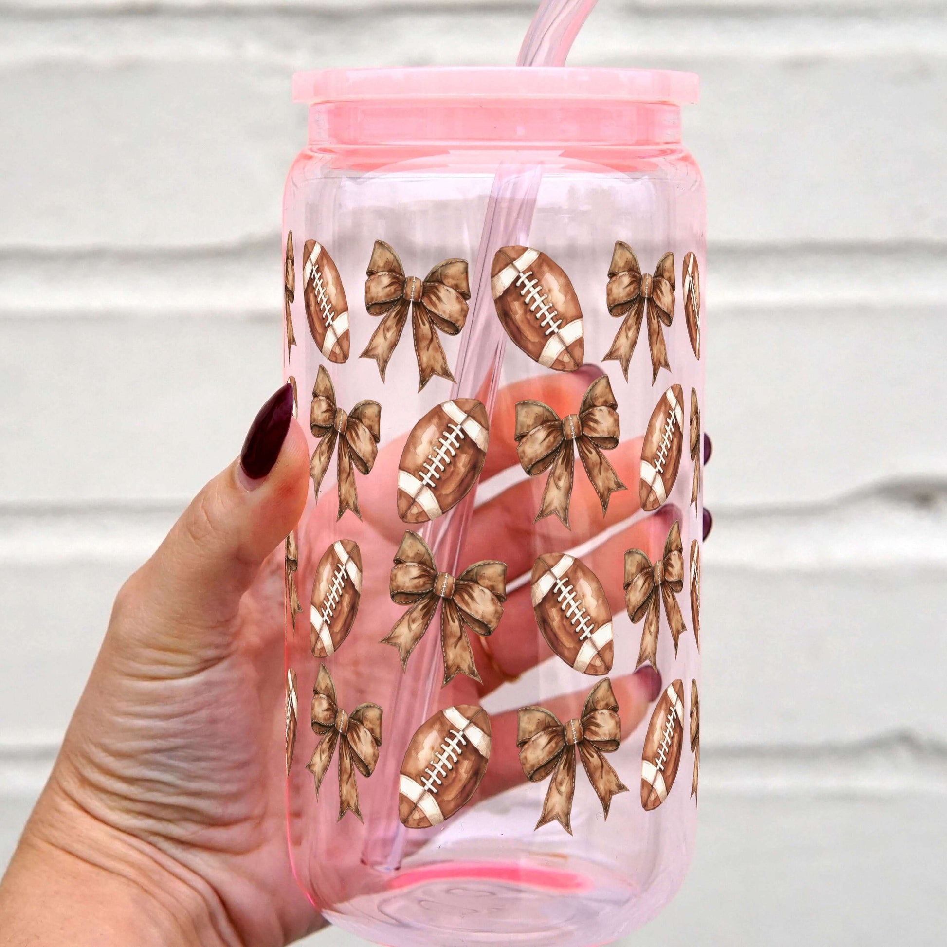 Football + Bows Cup With Lid and Straw from Sip Sip Hooray – Tumblers