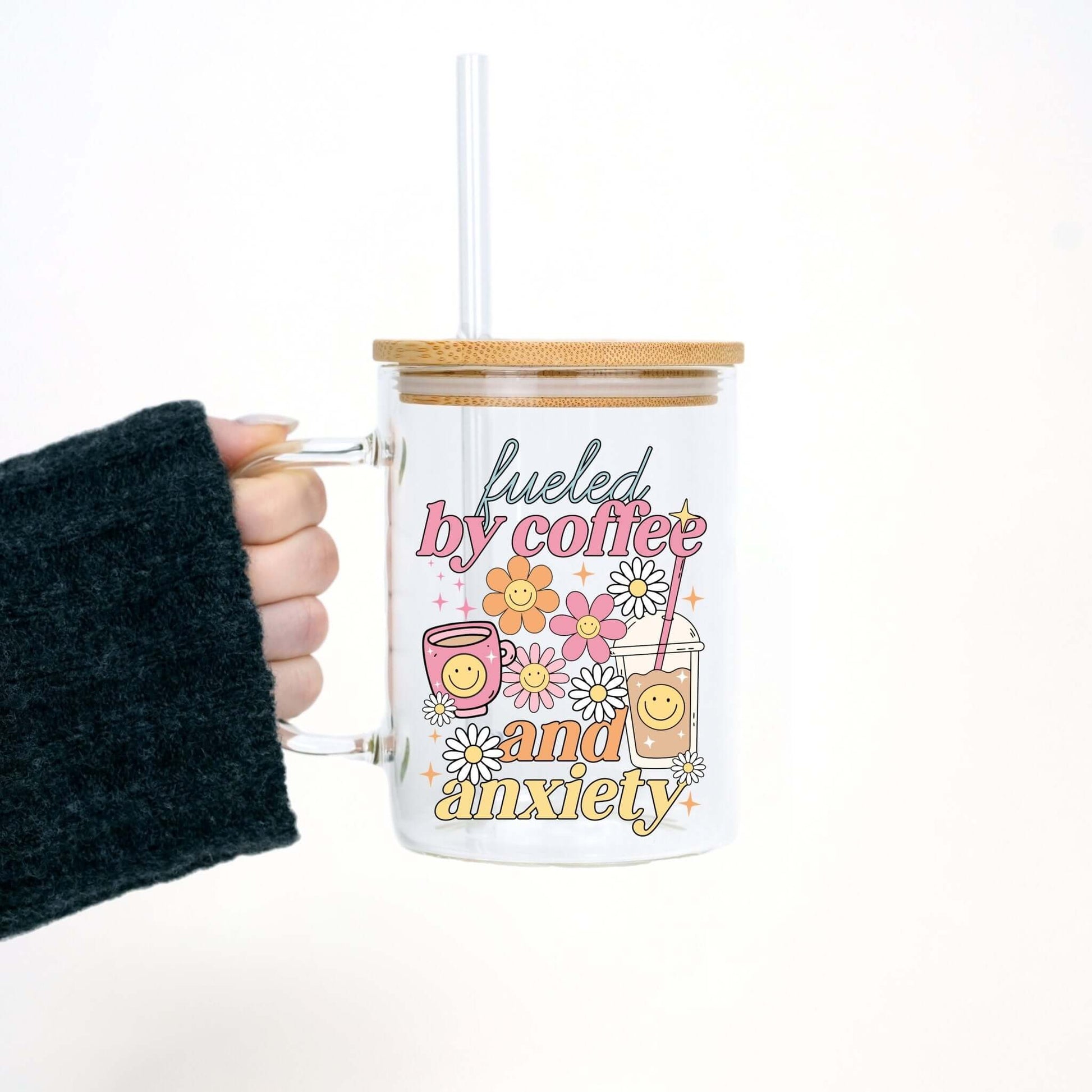 Fueled By Coffee and Anxiety 17oz Glass Mug With Lid and Straw from Sip Sip Hooray – Drink Sleeves