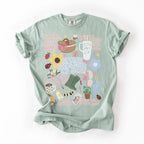 Sage green tee printed with a DTF transfer from the Sip-Sip Hooray! print floor