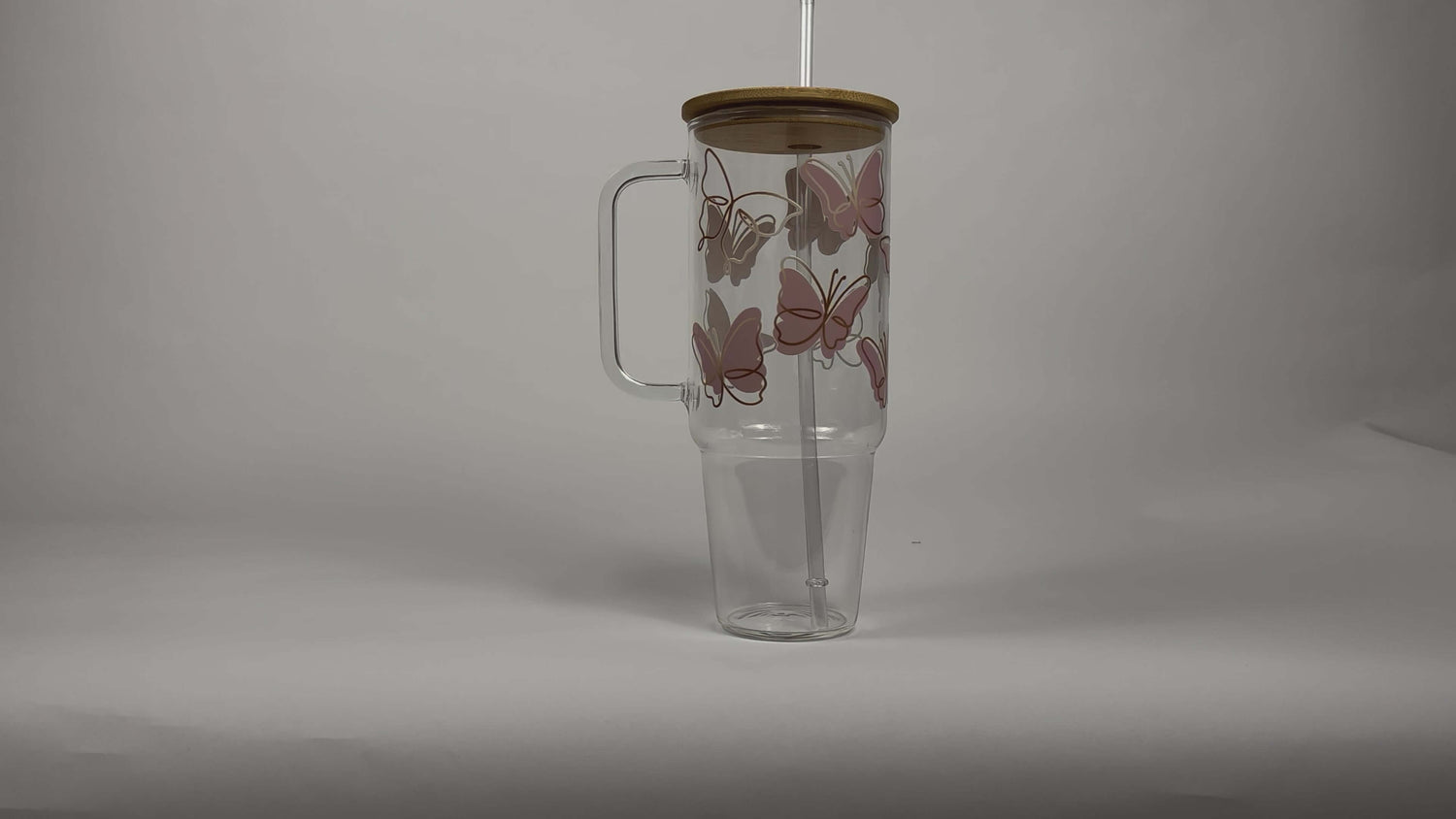 Pink Butterflies 40oz Glass Tumbler With Lid and Straw from Sip Sip Hooray – Drinkware