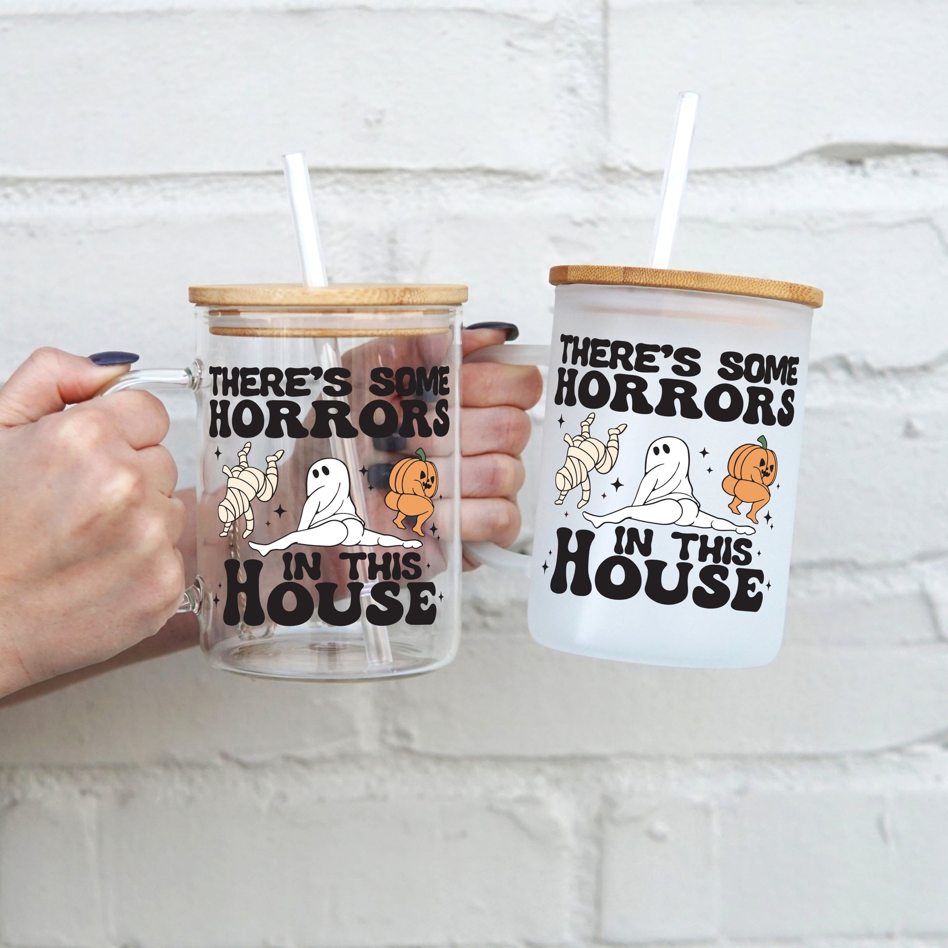 There's Some Horrors In This House 17oz Glass Mug With Lid and Straw - Sip Sip Hooray